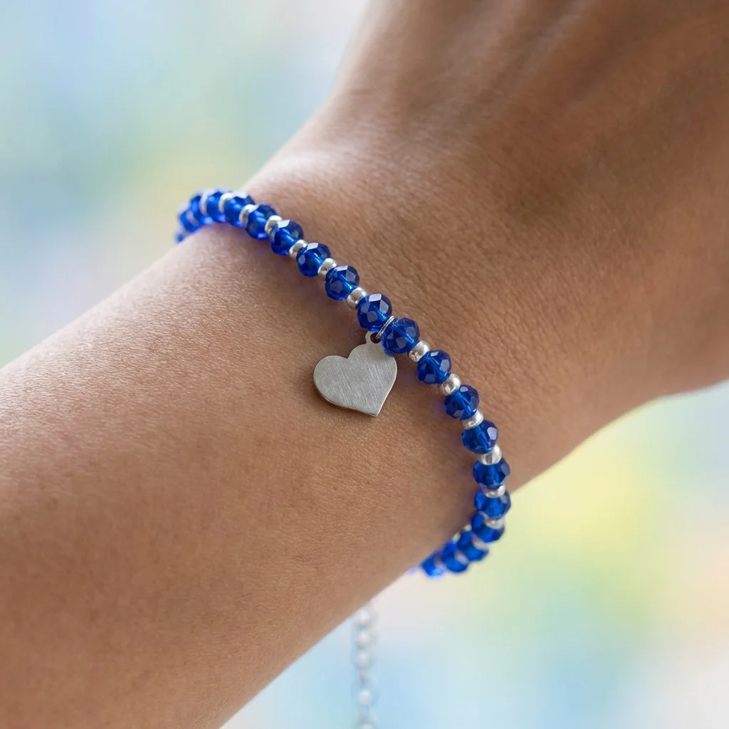 دستبند دخترانه فانتزی مدل صدفی طرح پرتو‌عشق