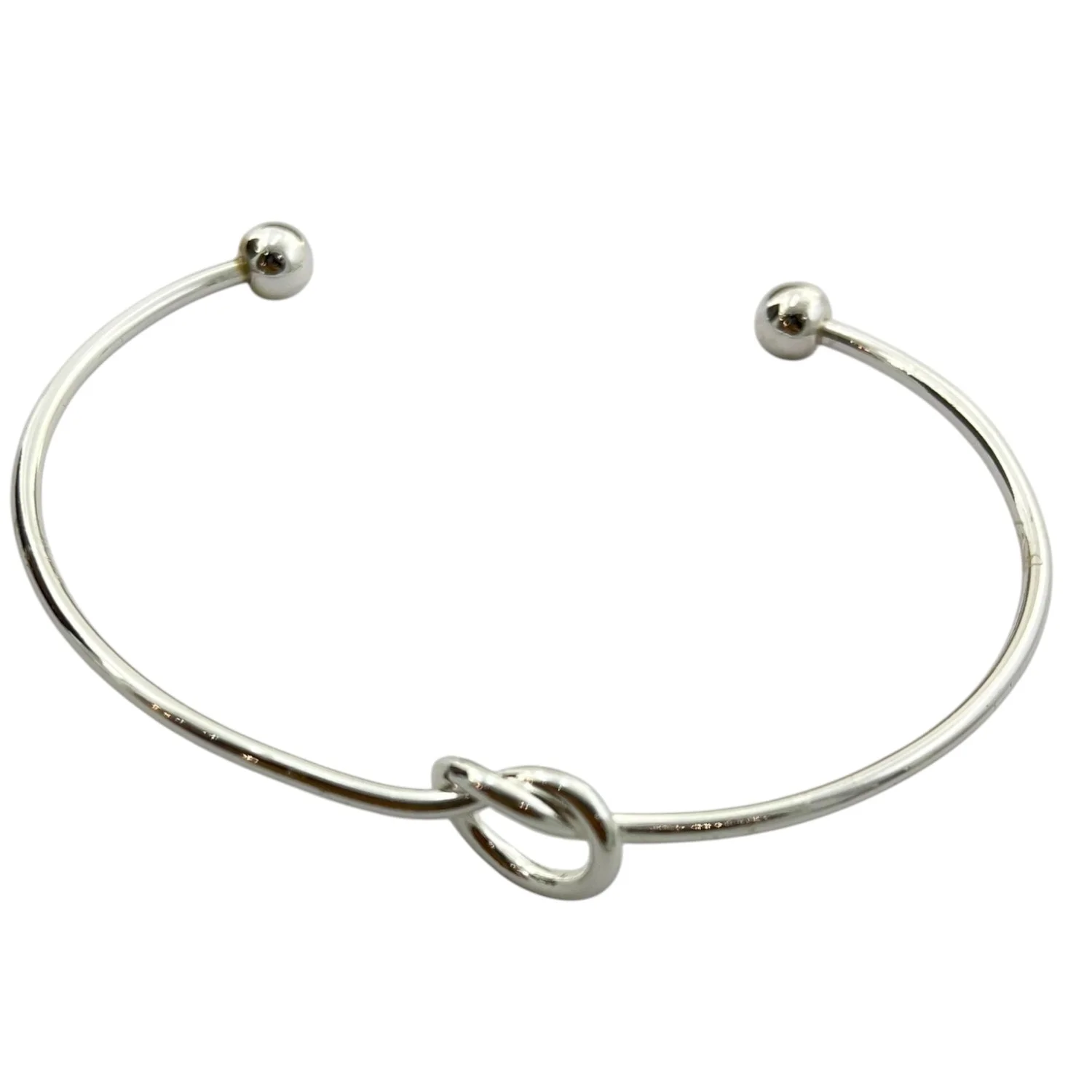 دستبند بنگل زنانه با طرح گره ظریف و آبکاری نقره ای