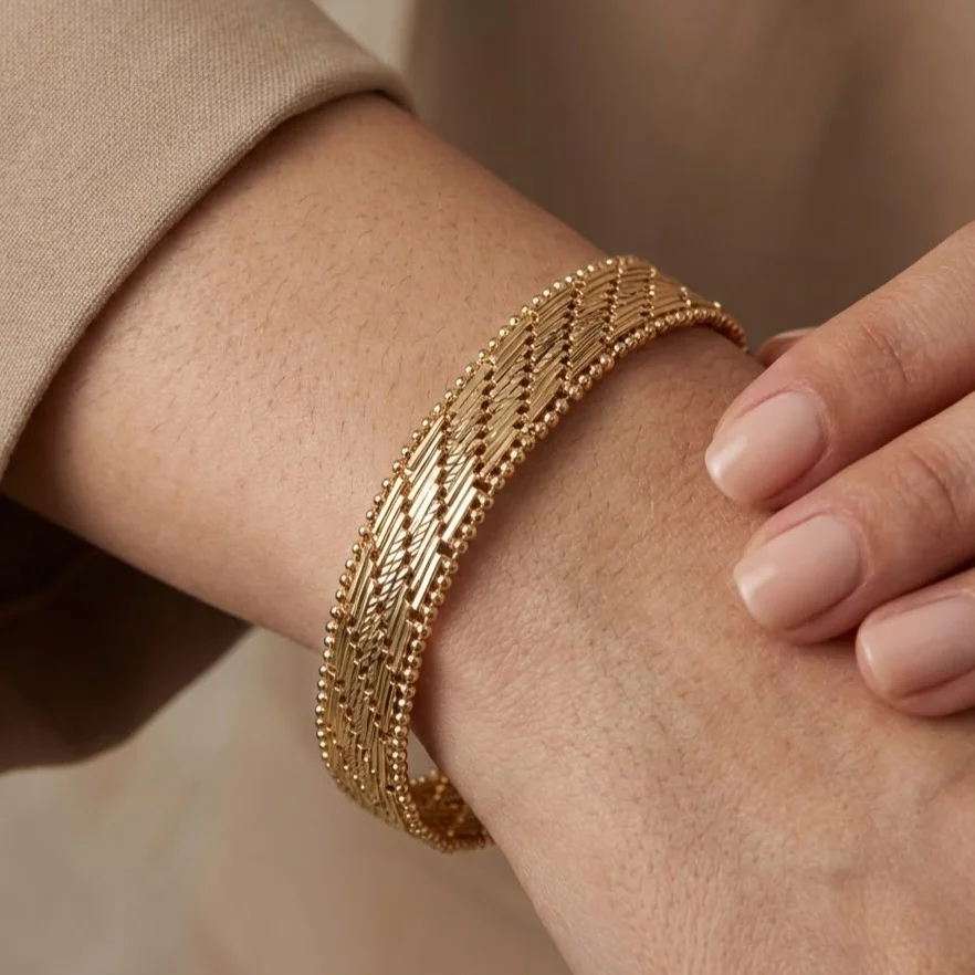 دستبند زنانه ژوپینگ لئوپرلا آرت‌ویو طرح بافت چندلایه با آبکاری طلایی