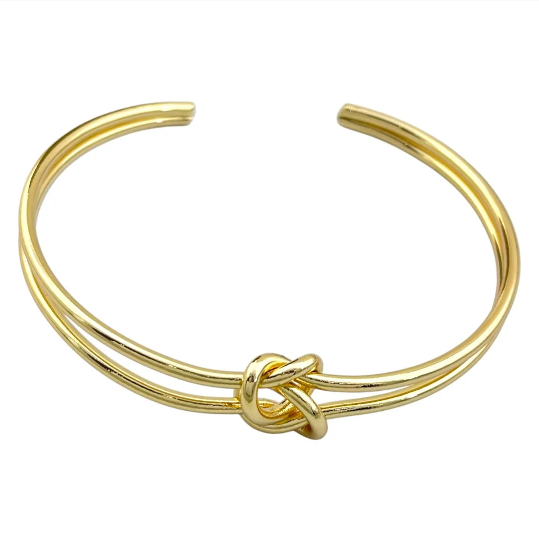 دستبند النگویی زنانه مدل ناتل طرح طلا با گره مینیمال