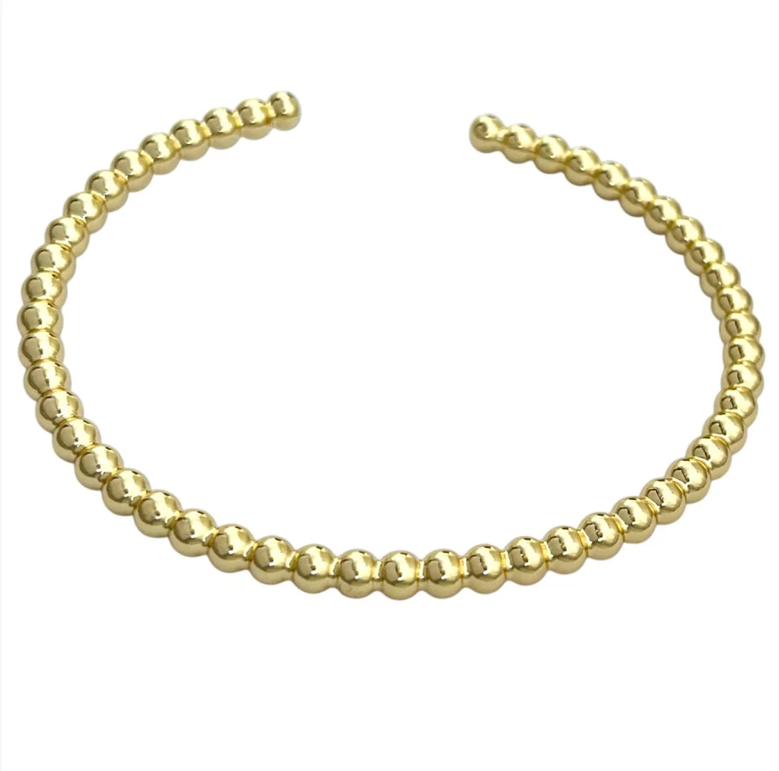 دستبند النگویی زنانه مدل آئوریبید طرح طلا توپی