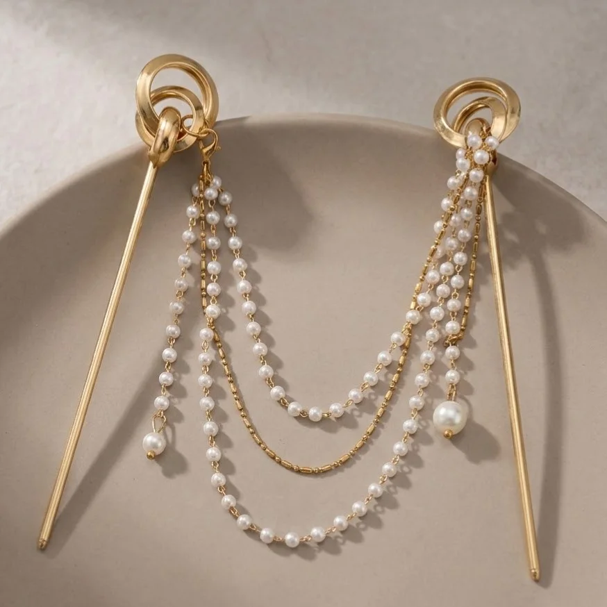 کانزاشی مو زنانه فلزی با آویز مروارید و زنجیر طلایی مدل آریونا