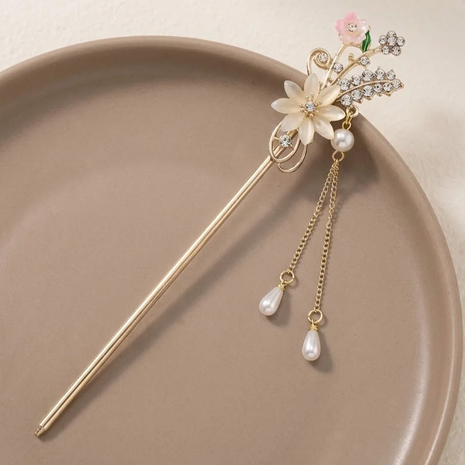 کانزاشی مو زنانه فلزی طرح گل و مروارید با آویز ظریف مدل مِریوِل