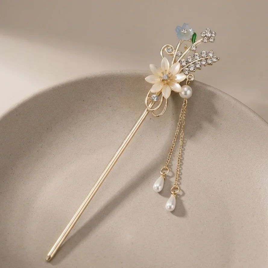 کانزاشی مو زنانه فلزی مدل لومیرا طرح گل کریستالی با آویز مروارید