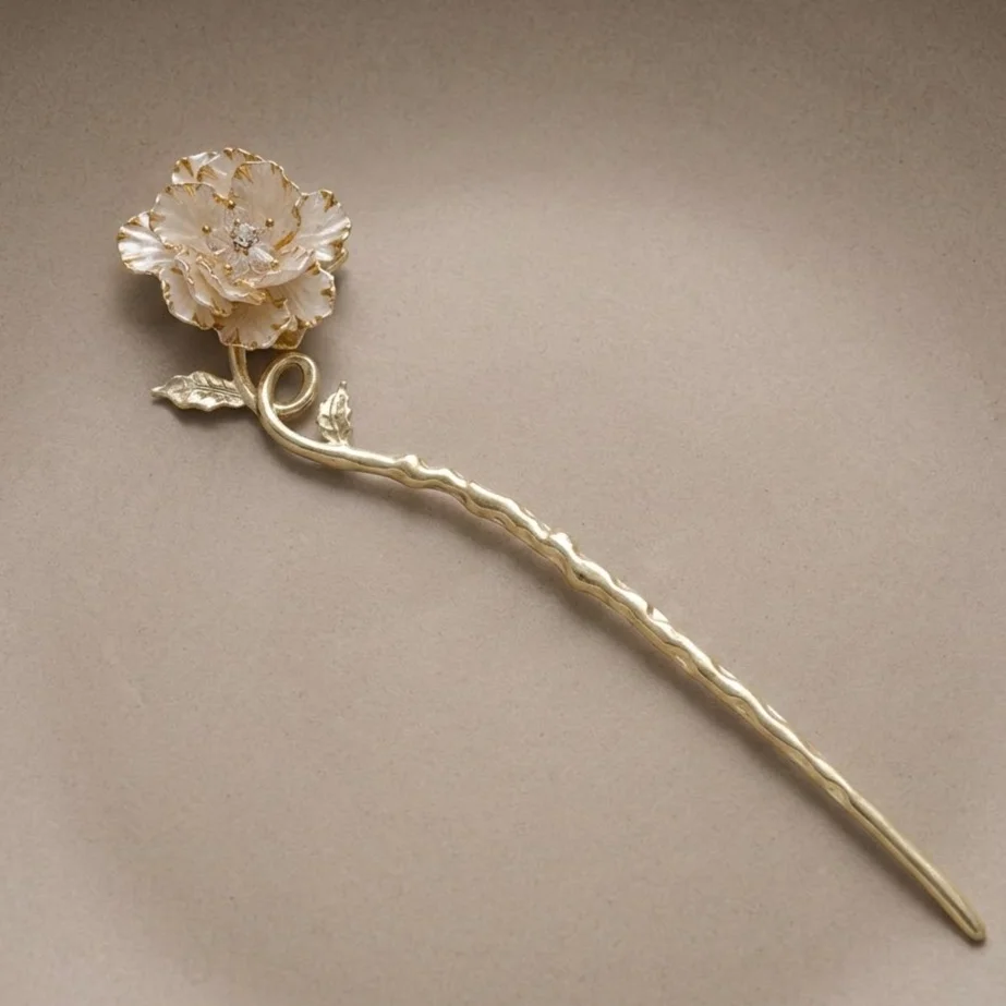 کانزاشی مو زنانه فلزی طرح گل با جلوه طلایی مدل آوریلا