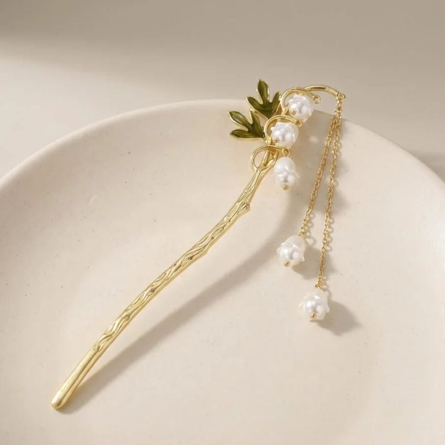 کانزاشی مو زنانه فلزی مدل فِلورینا طرح گل با آویز مروارید ظریف