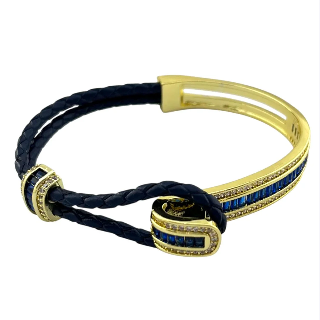 دستبند زنانه مدل آدلیا سرمه ای با بافت چرمی و جزئیات طلایی