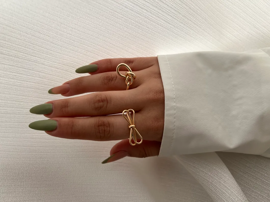 انگشتر مینیمال طرح پاپیون و گره با ظرافت خیره کننده