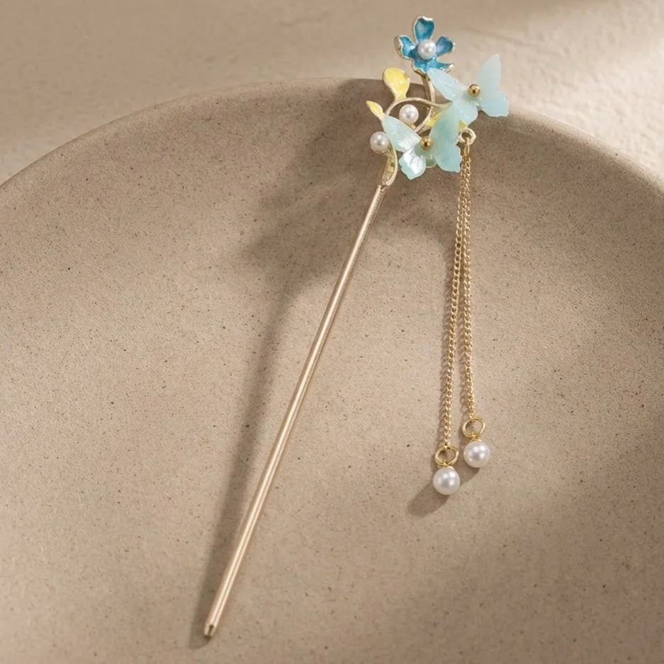 کانزاشی مو زنانه فلزی مدل آزورا طرح گل آبی با آویز مروارید